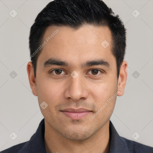 Joyful white young-adult male with short  black hair and brown eyes