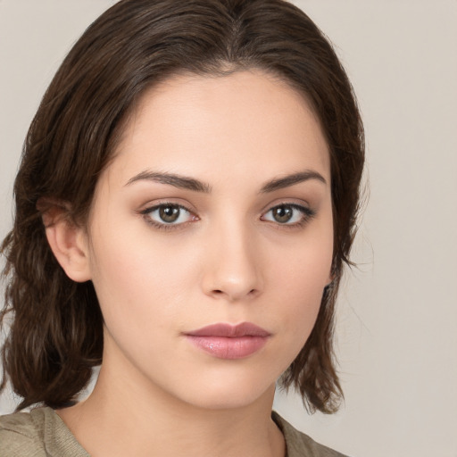 Neutral white young-adult female with medium  brown hair and brown eyes