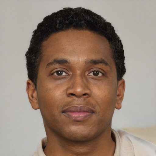 Neutral black young-adult male with short  brown hair and brown eyes