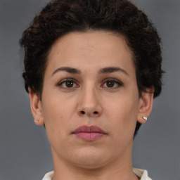 Neutral white young-adult female with short  brown hair and brown eyes