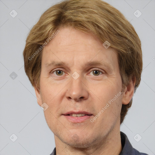 Joyful white adult male with short  brown hair and grey eyes