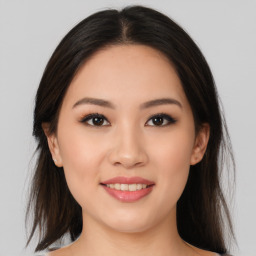 Joyful asian young-adult female with medium  brown hair and brown eyes