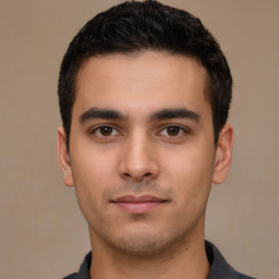 Neutral white young-adult male with short  black hair and brown eyes
