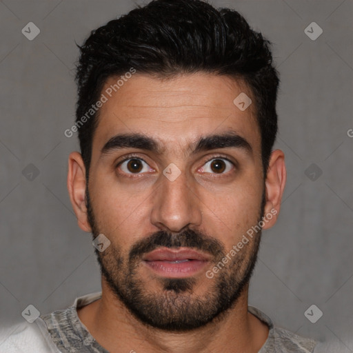 Joyful white young-adult male with short  black hair and brown eyes