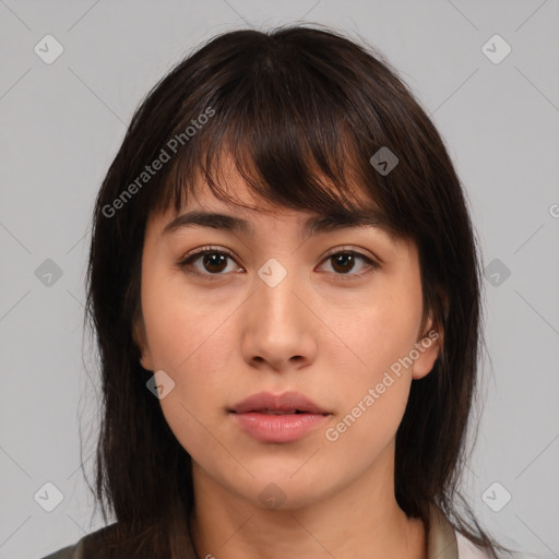 Neutral white young-adult female with medium  brown hair and brown eyes