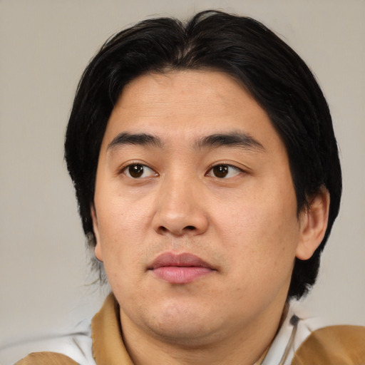 Neutral asian young-adult male with medium  brown hair and brown eyes