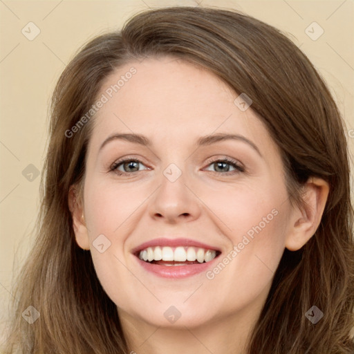 Joyful white young-adult female with long  brown hair and grey eyes