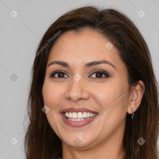 Joyful white young-adult female with long  brown hair and brown eyes