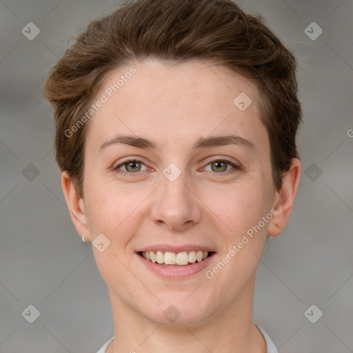 Joyful white young-adult female with short  brown hair and grey eyes