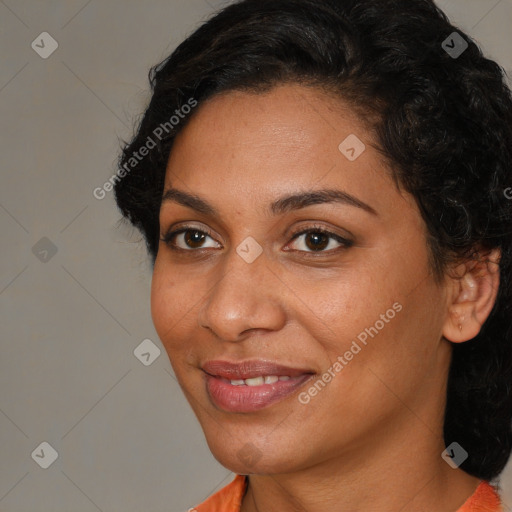 Joyful latino young-adult female with long  brown hair and brown eyes