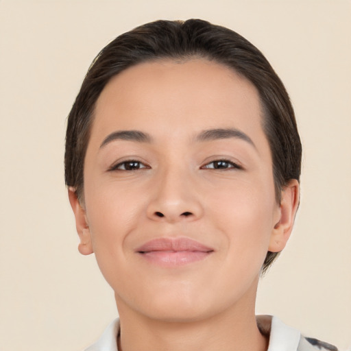 Joyful white young-adult female with short  brown hair and brown eyes