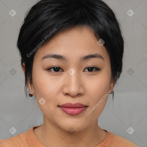 Joyful asian young-adult female with medium  black hair and brown eyes