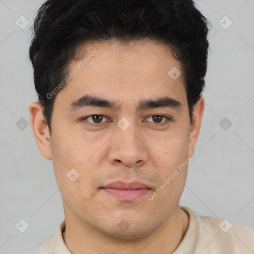 Joyful latino young-adult male with short  brown hair and brown eyes