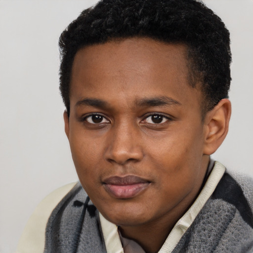 Neutral black young-adult male with short  brown hair and brown eyes