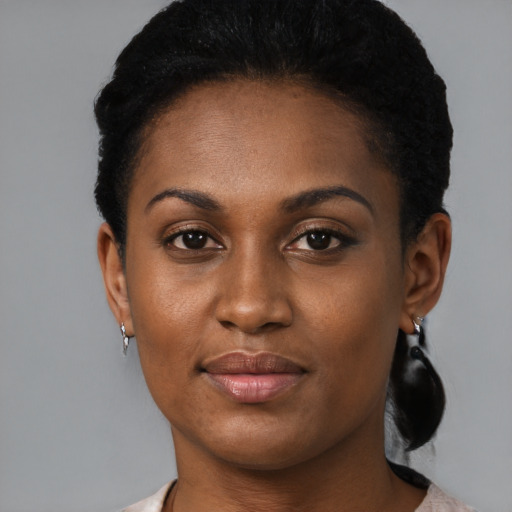 Neutral black young-adult female with short  brown hair and brown eyes