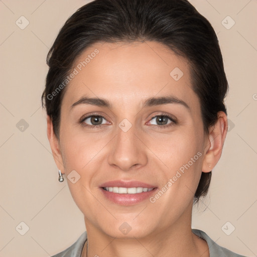 Joyful white young-adult female with medium  brown hair and brown eyes