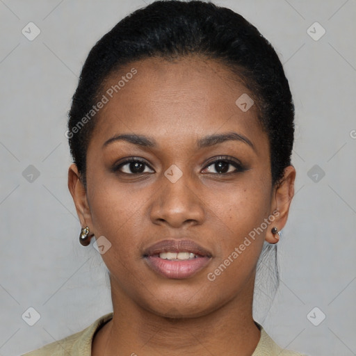 Joyful black young-adult female with short  brown hair and brown eyes