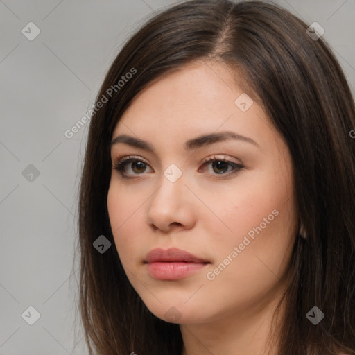 Neutral white young-adult female with long  brown hair and brown eyes