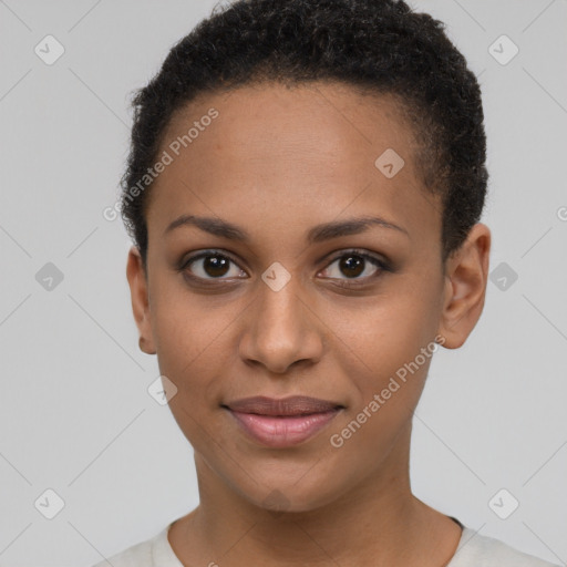 Joyful black young-adult female with short  brown hair and brown eyes