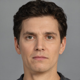 Neutral white adult male with short  brown hair and brown eyes