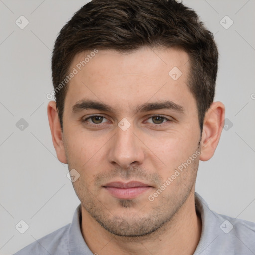 Neutral white young-adult male with short  brown hair and brown eyes