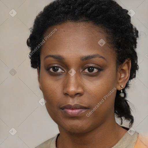 Neutral black young-adult female with short  black hair and brown eyes