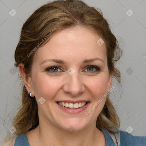 Joyful white young-adult female with medium  brown hair and blue eyes