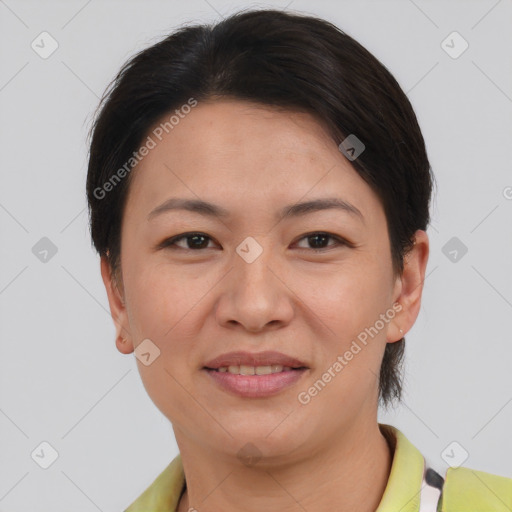 Joyful white adult female with short  brown hair and brown eyes