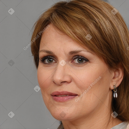 Joyful white adult female with medium  brown hair and brown eyes