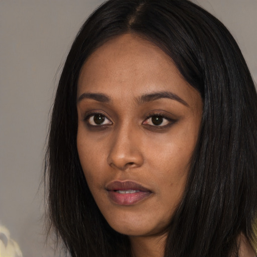 Neutral asian young-adult female with long  brown hair and brown eyes