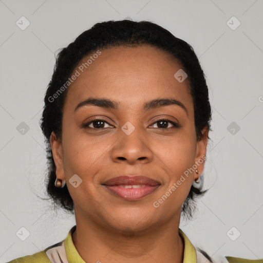 Joyful latino young-adult female with short  black hair and brown eyes