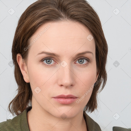 Neutral white young-adult female with medium  brown hair and grey eyes