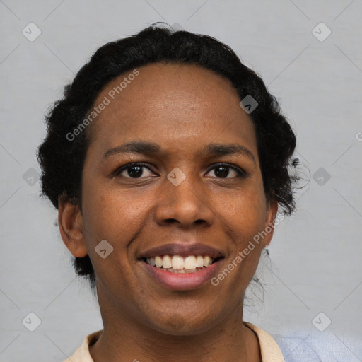 Joyful black young-adult female with short  black hair and brown eyes