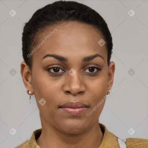 Joyful black young-adult female with short  brown hair and brown eyes