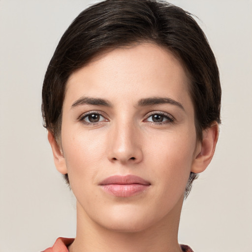 Neutral white young-adult female with short  brown hair and brown eyes