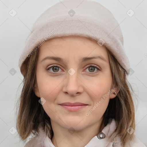 Joyful white young-adult female with medium  brown hair and grey eyes