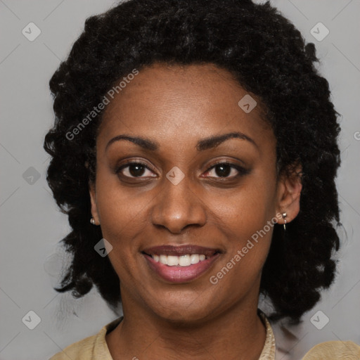 Joyful black young-adult female with medium  black hair and brown eyes