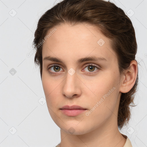 Neutral white young-adult female with medium  brown hair and green eyes