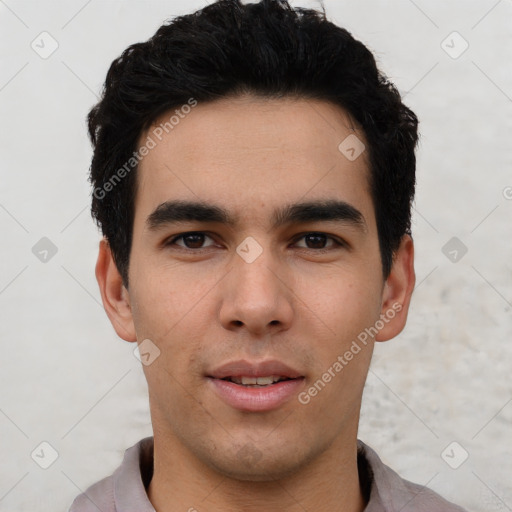 Joyful asian young-adult male with short  black hair and brown eyes