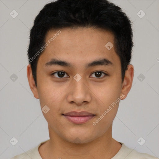 Joyful latino young-adult male with short  black hair and brown eyes