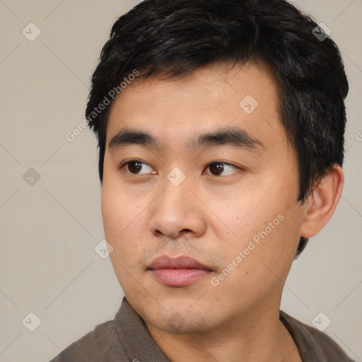 Neutral asian young-adult male with short  black hair and brown eyes
