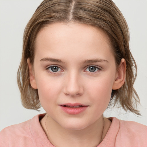 Joyful white child female with medium  brown hair and grey eyes