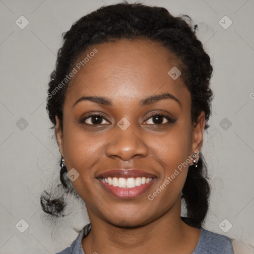 Joyful black young-adult female with medium  black hair and brown eyes