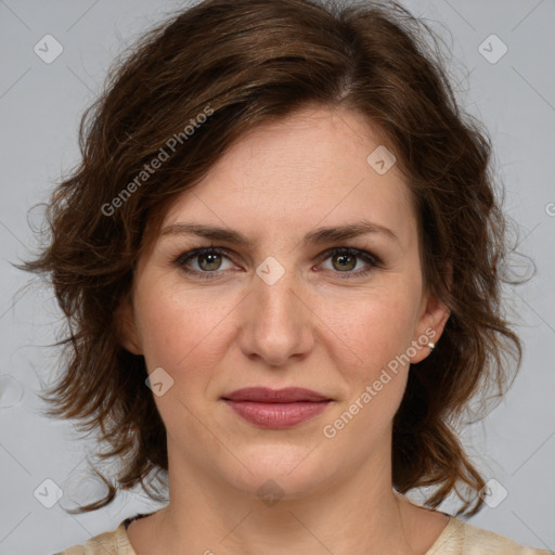 Joyful white young-adult female with medium  brown hair and green eyes