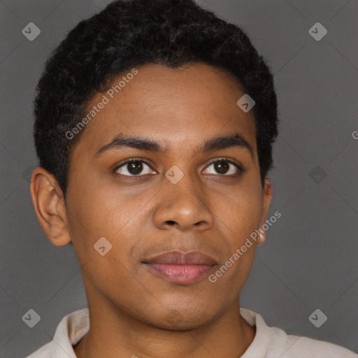 Joyful black young-adult male with short  brown hair and brown eyes