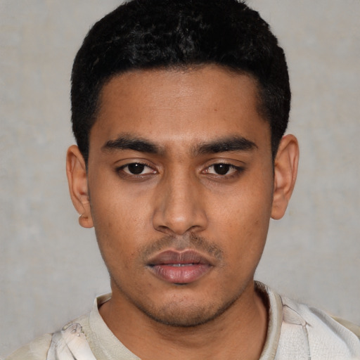 Neutral latino young-adult male with short  black hair and brown eyes