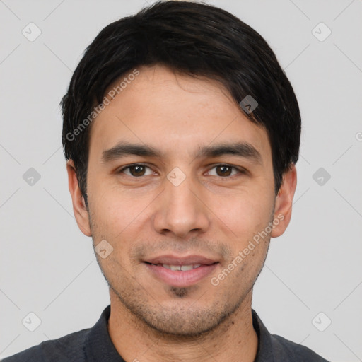 Joyful white young-adult male with short  black hair and brown eyes