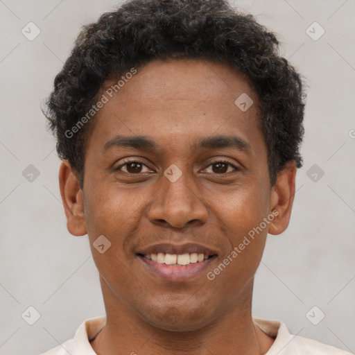 Joyful latino young-adult male with short  brown hair and brown eyes