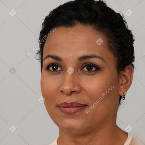 Joyful latino young-adult female with short  brown hair and brown eyes