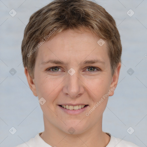 Joyful white young-adult female with short  brown hair and grey eyes